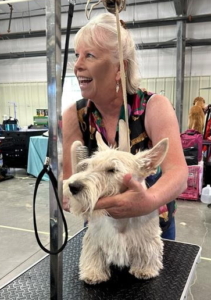 Charlie giving us grooming tips for Yin (Bilbo) at the Plum Creek Classics.